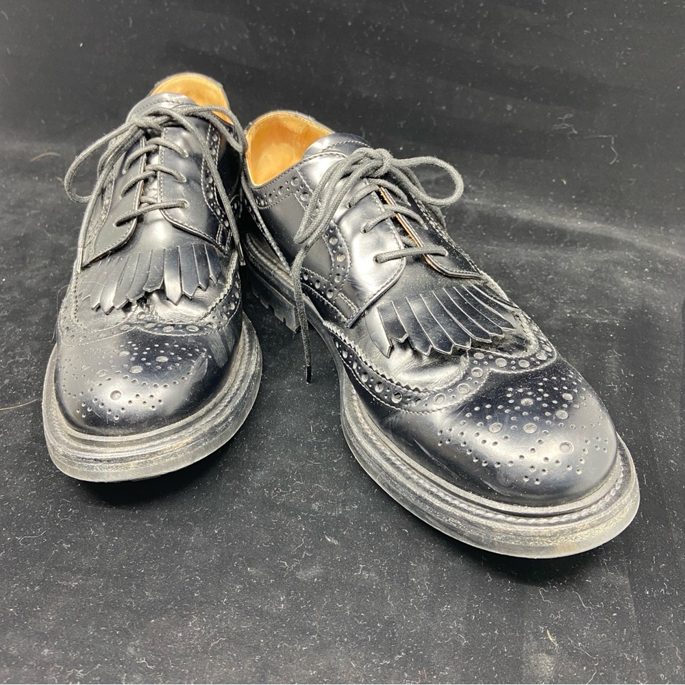 Church's Black Oxfords with Decorative Perforations and Kiltie Flaps